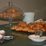 Subur Maritim מלון סיטגס